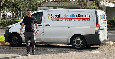 Eli the locksmith in front of a van