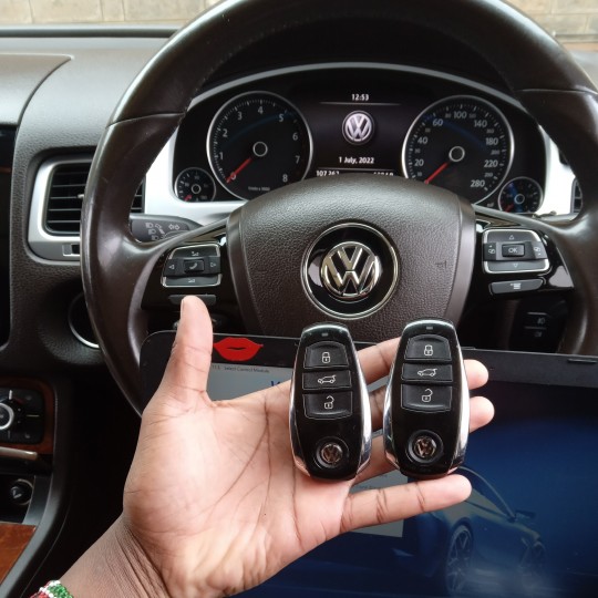 Two VW Remote Keys in a Palm